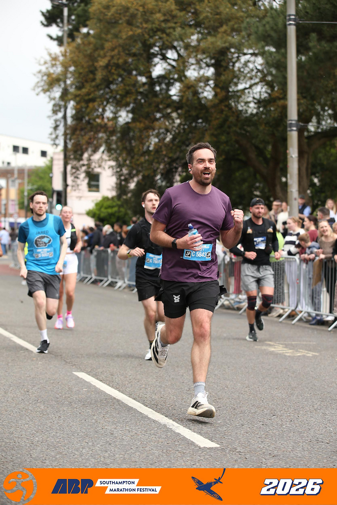 Matt crossing the finish line at the Southampton Half Marathon 2026